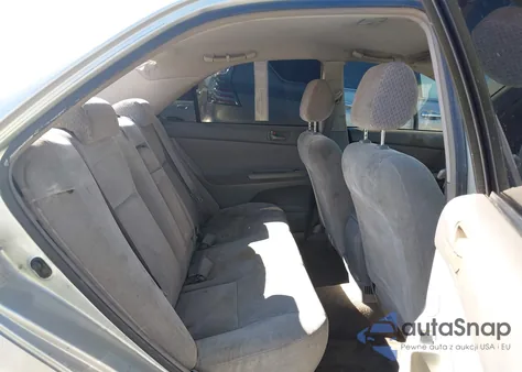 2003 Toyota Camry Le z USA, uszkodzony, nr VIN JTDBE32KX30154150